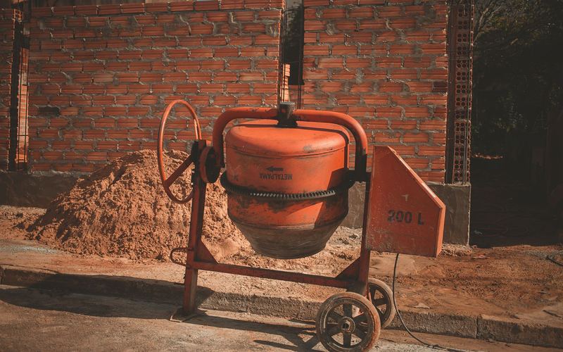 Site cement mixer, part of our small plant and tool hire (illustrative stock photo)