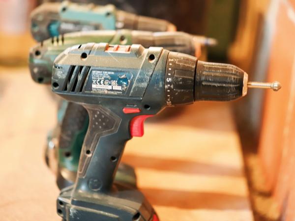Cordless drills and power tools for site work (illustrative stock photo)