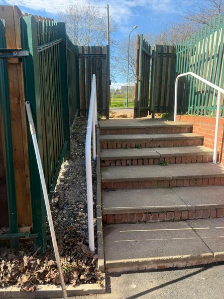 New concrete steps with handrail