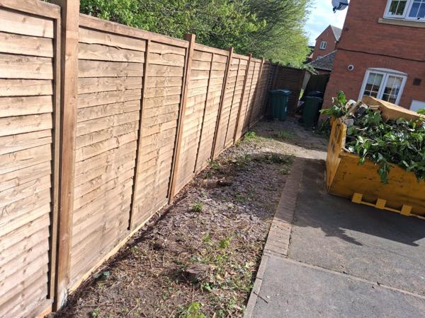 New close-board fencing and path