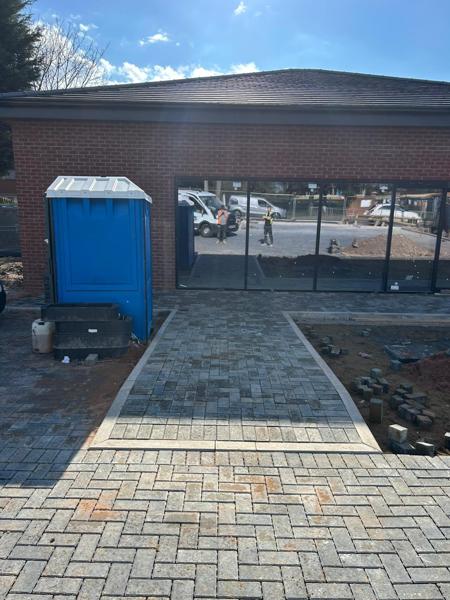 Block-paved entrance path to a new commercial unit