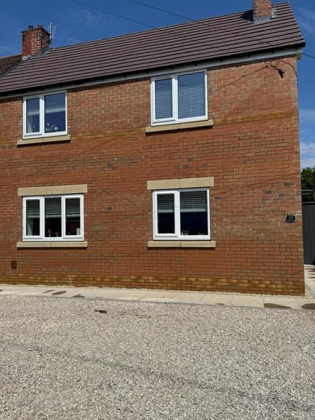 Completed brickwork on a new-build house