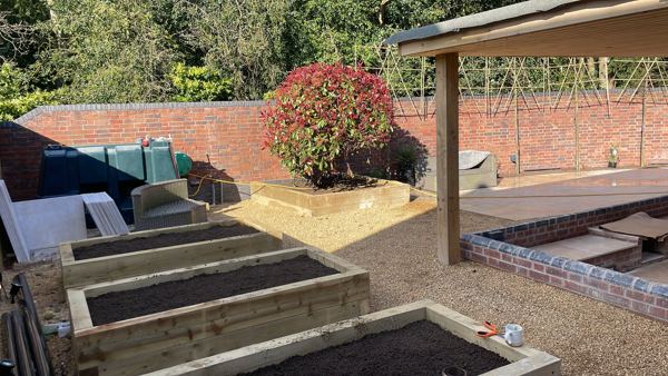Lichfield garden transformation: sandstone paving, sleeper beds, gravel and hardwood pergola – Staff4dshire Properties
