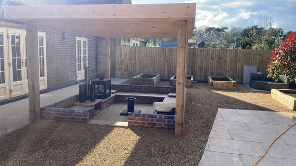 Lichfield garden transformation: sandstone paving, sleeper beds, gravel and hardwood pergola – Staff4dshire Properties