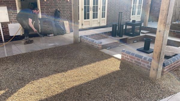 Lichfield garden transformation: sandstone paving, sleeper beds, gravel and hardwood pergola – Staff4dshire Properties