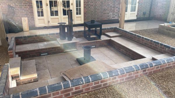 Lichfield garden transformation: sandstone paving, sleeper beds, gravel and hardwood pergola – Staff4dshire Properties