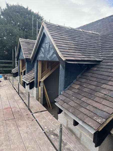 Plain tile roofs to a row of dormers – Staff4dshire Roofing Specialists