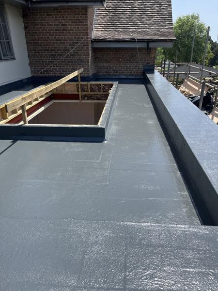 GRP fibreglass flat roof with roof lanterns on an extension – Staff4dshire Roofing Specialists
