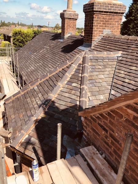 Re-roofed terrace in clay tiles with scaffold access – Staff4dshire Roofing Specialists