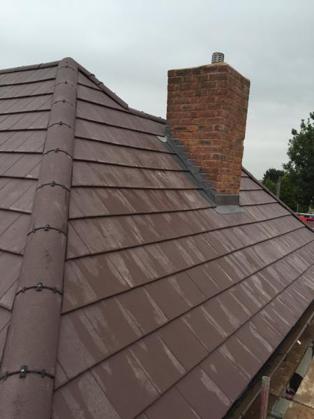 New chimney flashing and tiled roof – Staff4dshire Roofing Specialists