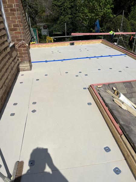 Flat roof insulation and membrane being installed – Staff4dshire Roofing Specialists